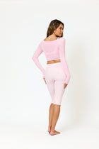 KAIA TWIST LONG SLEEVE TOP